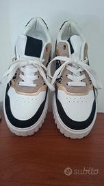 Sneakers basse platform con dettagli animalier