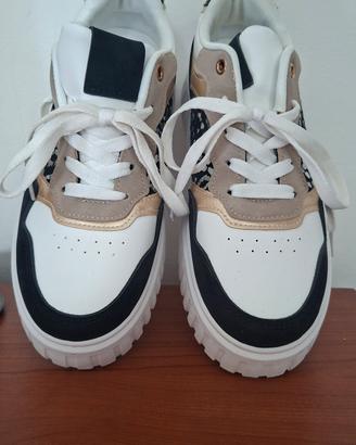 Sneakers basse platform con dettagli animalier