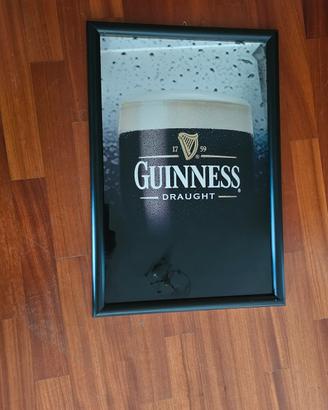 specchio pubblicitario birra Guinnes