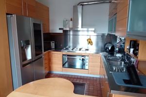 Trilocale con giardino privato e box doppio