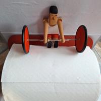 Portarotolone "Sollevatore di pesi". Vintage 80s.