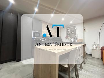 Casetta a schiera quadrilocale su tre livelli