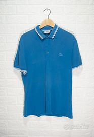 Polo Lacoste azzurra con profili bianchi L