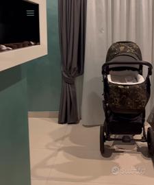 Culla ovale a baldacchino e Trio Junama