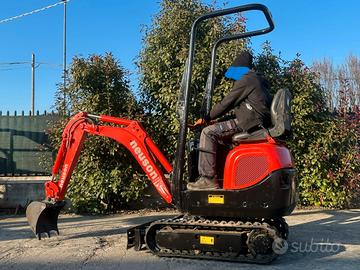 E213 Mini escavatore Neuson 10 q carro allargabile