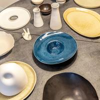 Piatti artigianali realizzati da ceramista