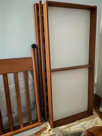 Lettino a sbarre con cassettone