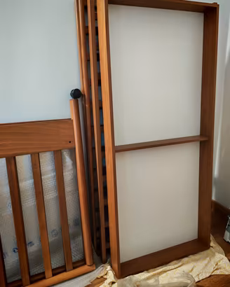 Lettino a sbarre con cassettone