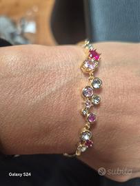 Bracciale Dorato con Cristalli Rosa e Punti Luce