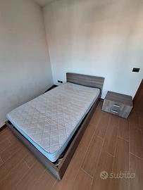 Letto con rete,materasso e comodino