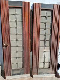 porta d'ingresso in legno massello e ferro battuto