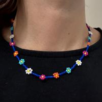 Set bracciale e collana con perline colorate