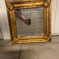 Antico specchio antico del 800 a foglia doro