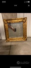 Antico specchio antico del 800 a foglia doro