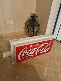 insegna coca cola