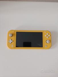 Nintendo switch lite gialla + lotto di 7 giochi