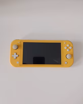 Nintendo switch lite gialla + lotto di 7 giochi