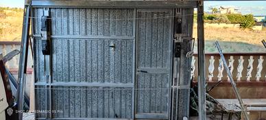 basculante motorizzata per garage  con porta
