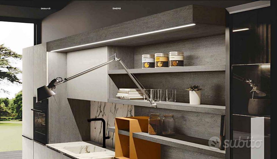 CUCINA LINEARE. ISOLA CON FUOCHI TAVOLO ESTRAIBILE - Arredamento e