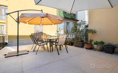 TRILOCALE RISTRUTTURATO CON TERRAZZO IN CENTRO