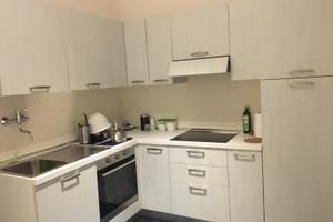 Appartamento piano alto con garage e cantina