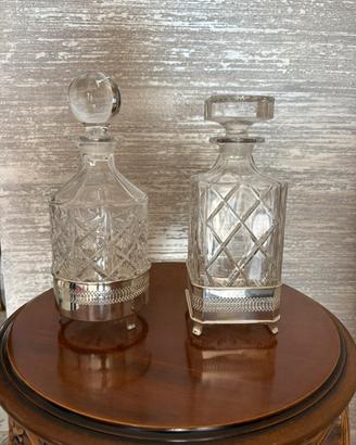 Bottiglie in cristallo con base in argento
