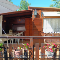 Roulotte+ casetta in legno con posto auto