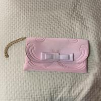 Pochette rosa da polso fiocco La fille des fleurs