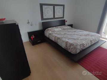 Camera matrimoniale etnica in vero legno