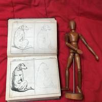 disegno artistico libro e manichino