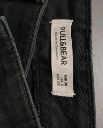 Pantaloni con tasche laterali