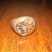 Anello Nove25 meccanismo orologio in argento