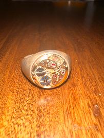 Anello Nove25 meccanismo orologio in argento