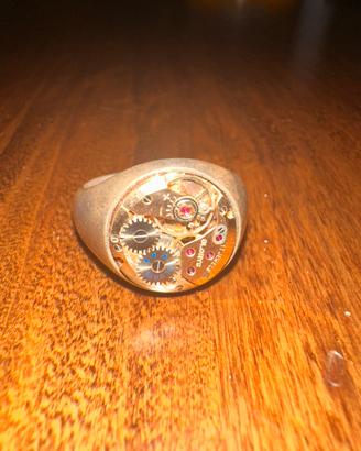 Anello Nove25 meccanismo orologio in argento