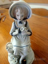 statuina in porcellana 