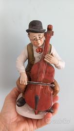 statuina violoncellista 