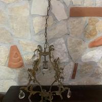 Lampadario vintage in ottone e cristallo