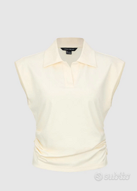 Polo bianca con maniche ad aletta