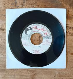 Disco reggae 45 giri Flourgan Tank God Mi a Ras
