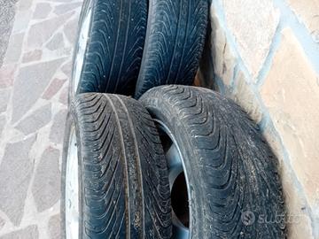 4 gomme 185/60/R 15  estive  quasi nuove co cerchi