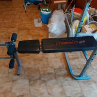 Panca piana, bilanciere e serie di pesi