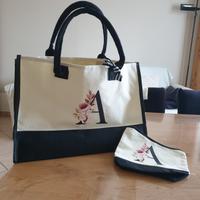 BORSA ELEGANTE CON POCHETTE. 