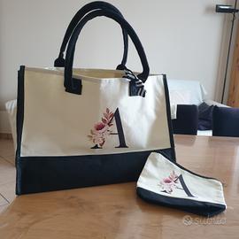 BORSA ELEGANTE CON POCHETTE. 
