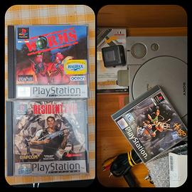 Playstation 1 + Resident evil 1 + Dino crisis