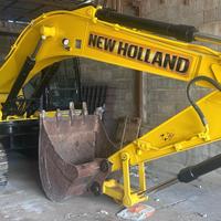 escavatore New Holland 245
