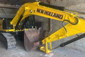 escavatore New Holland 245