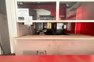 Locale commerciale con canna fumaria