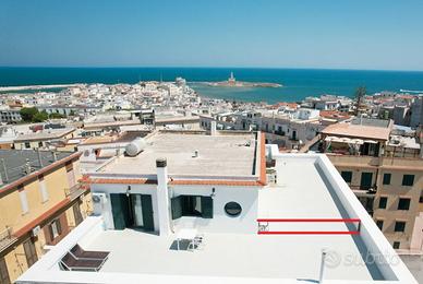 Attico in centro con vista mare