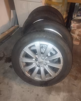 4 cerchi in lega 205/60 R16  MOMO usati.