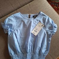 Camicetta bambina taglia 110 cm nuova.